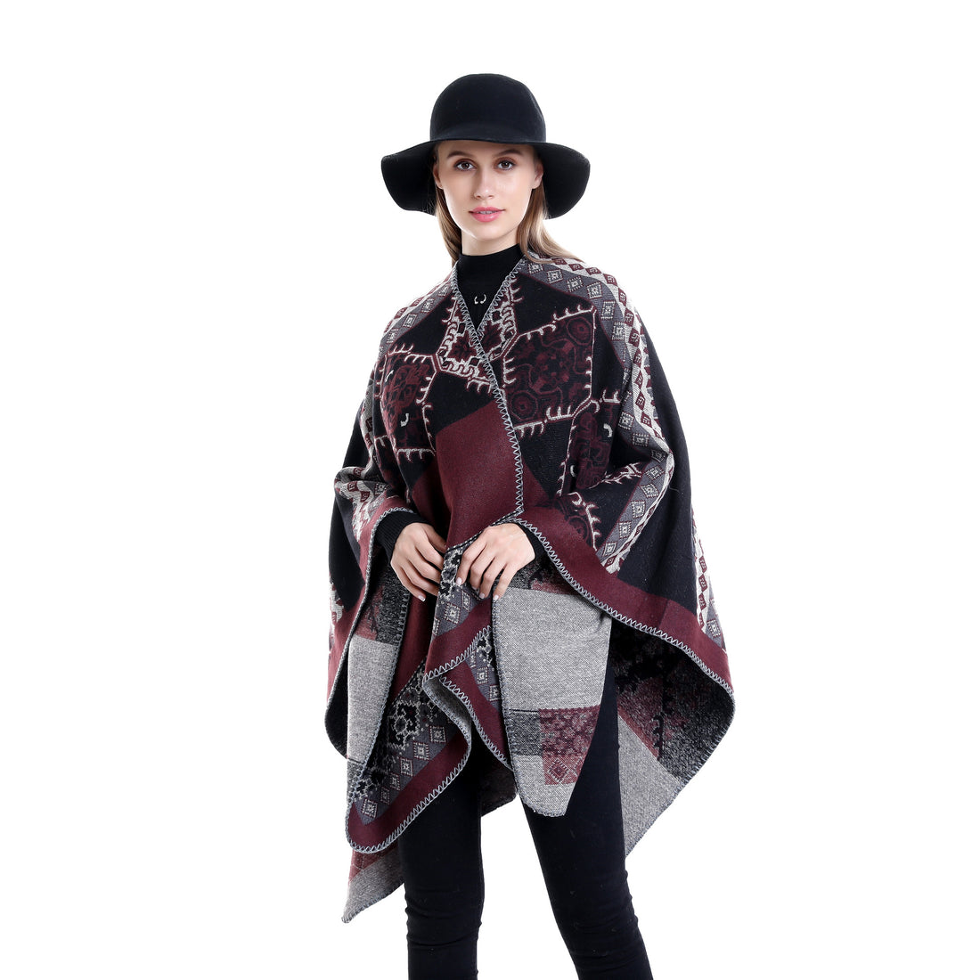 Damen Oversize-Ruana-Poncho aus Jacquardgewebe mit asymmetrischem Zipfelrand und ornamentaler Bordüre – Célinea