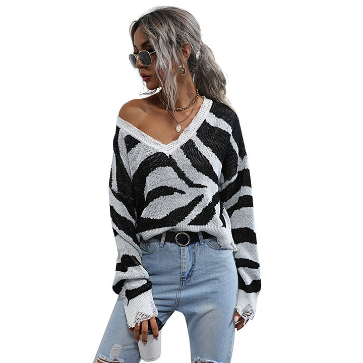 Damen Oversize V-Ausschnitt Strickpullover mit Zebramuster und ausgefranstem Saum Echoarchiv