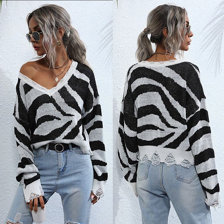 Damen Oversize V-Ausschnitt Strickpullover mit Zebramuster und ausgefranstem Saum Echoarchiv