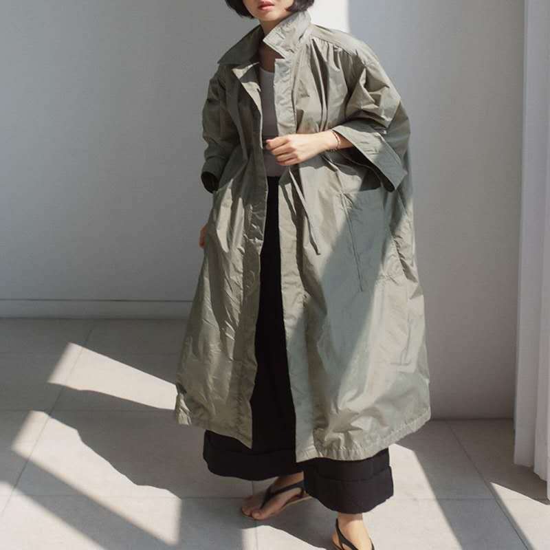 Damen Longline-Parka im leichten Windbreaker-Stil mit innenliegendem Futter, Tunnelzug und Pattentaschen – Célinea