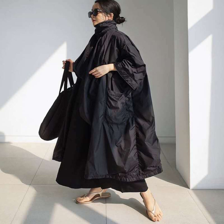 Damen Longline-Parka im leichten Windbreaker-Stil mit innenliegendem Futter, Tunnelzug und Pattentaschen – Célinea