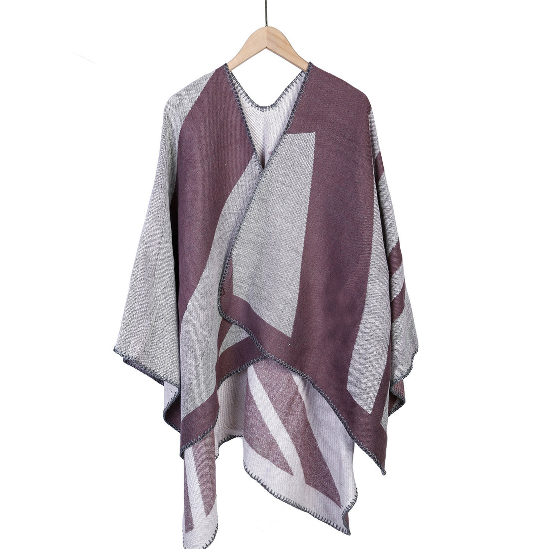 Damen Oversize-Ruana mit grafischem Blockmuster und dekorativer Kettelnaht – Célinea