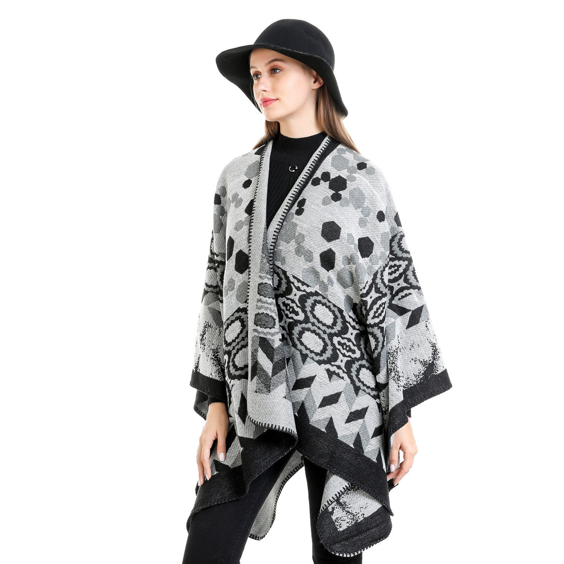 Damen Gemusterter Jacquard-Ruana-Überwurf mit V-Ausschnitt und Kettelnaht – Veloura