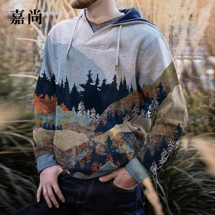Herren geräumiger Kapuzenpullover mit großflächigem Bergwald-Print und Kängurutasche Echoarchiv
