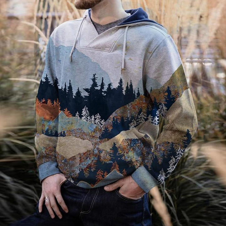 Herren geräumiger Kapuzenpullover mit großflächigem Bergwald-Print und Kängurutasche Echoarchiv