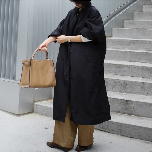 Damen Langer Oversize-Dustercoat mit Rückenschlitz, überschnittener Schulter und praktischen Eingrifftaschen – Célinea