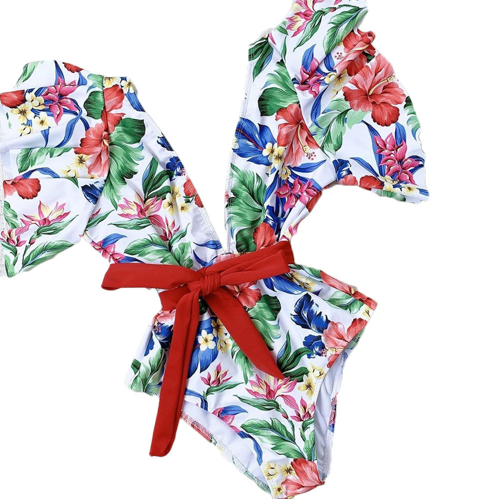 Damen Eleganter Badeanzug mit Volantärmeln und Taillengürtel Echo Archiv