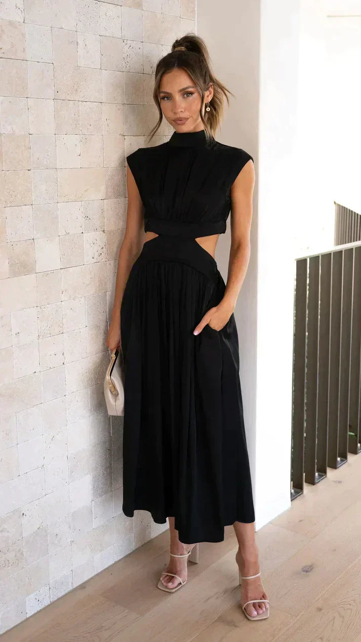 Echoarchiv | Eleganter Jumpsuit mit Cut-Out Taille