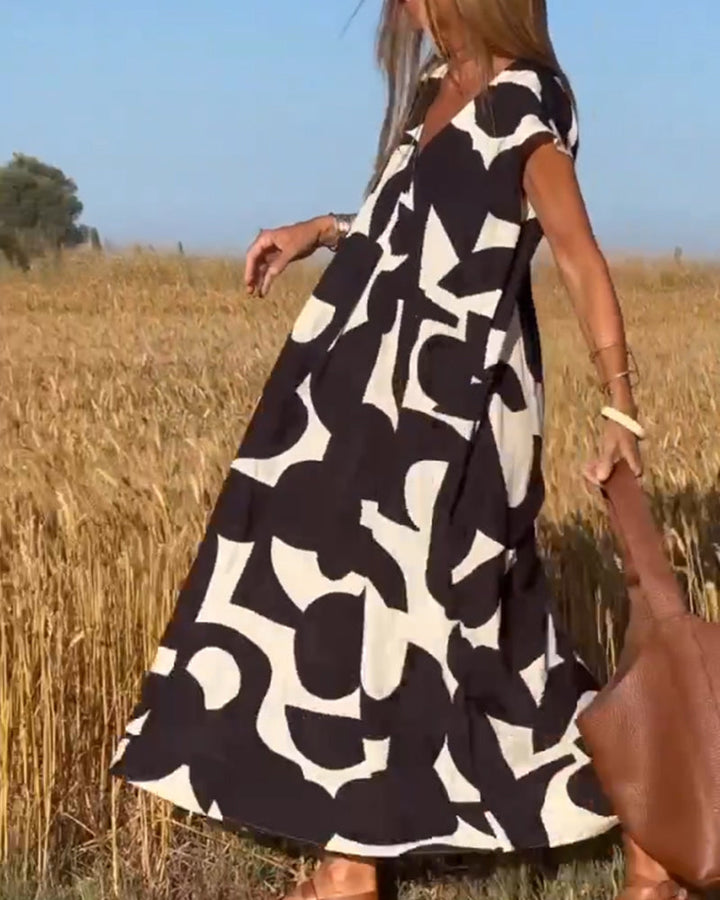 Echoarchiv | Amara Maxikleid mit Print und V-Ausschnitt