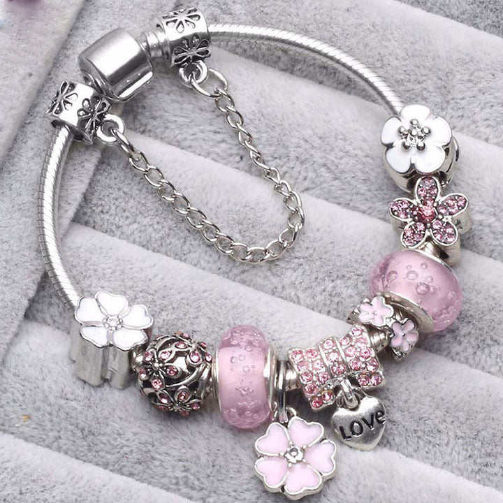 Echoarchiv | Pfirsichblüten Charme Armband