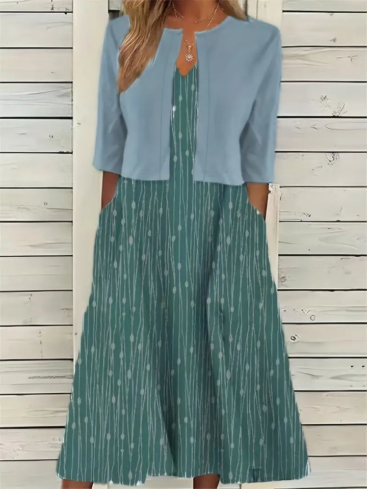 Echoarchiv – elegantes zweiteiliges blumenkleid-set mit einfarbigem crop-top und kleid mit rundhalsausschnitt