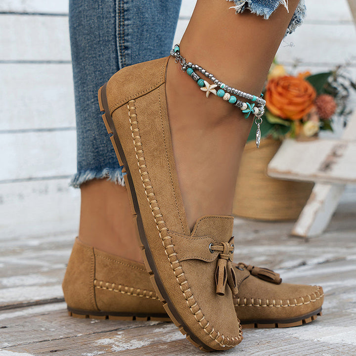Echoarchiv | Klassische Wildleder Slipper mit Quastendetail für Damen