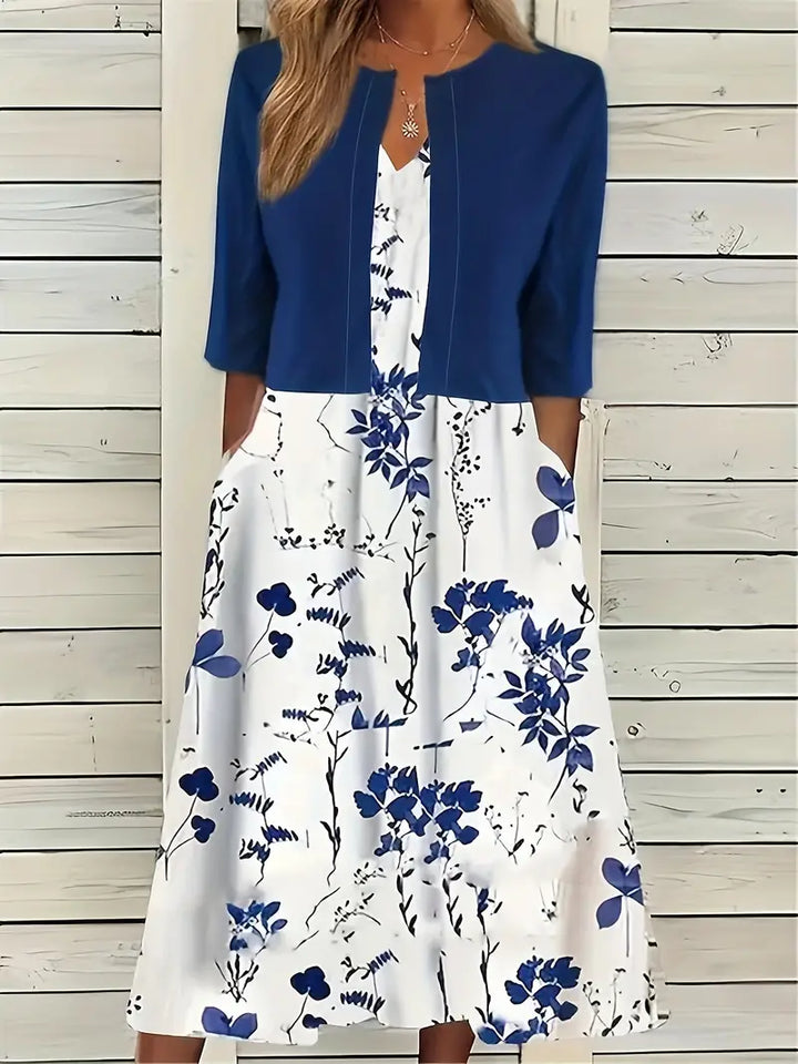 Echoarchiv – elegantes zweiteiliges blumenkleid-set mit einfarbigem crop-top und kleid mit rundhalsausschnitt