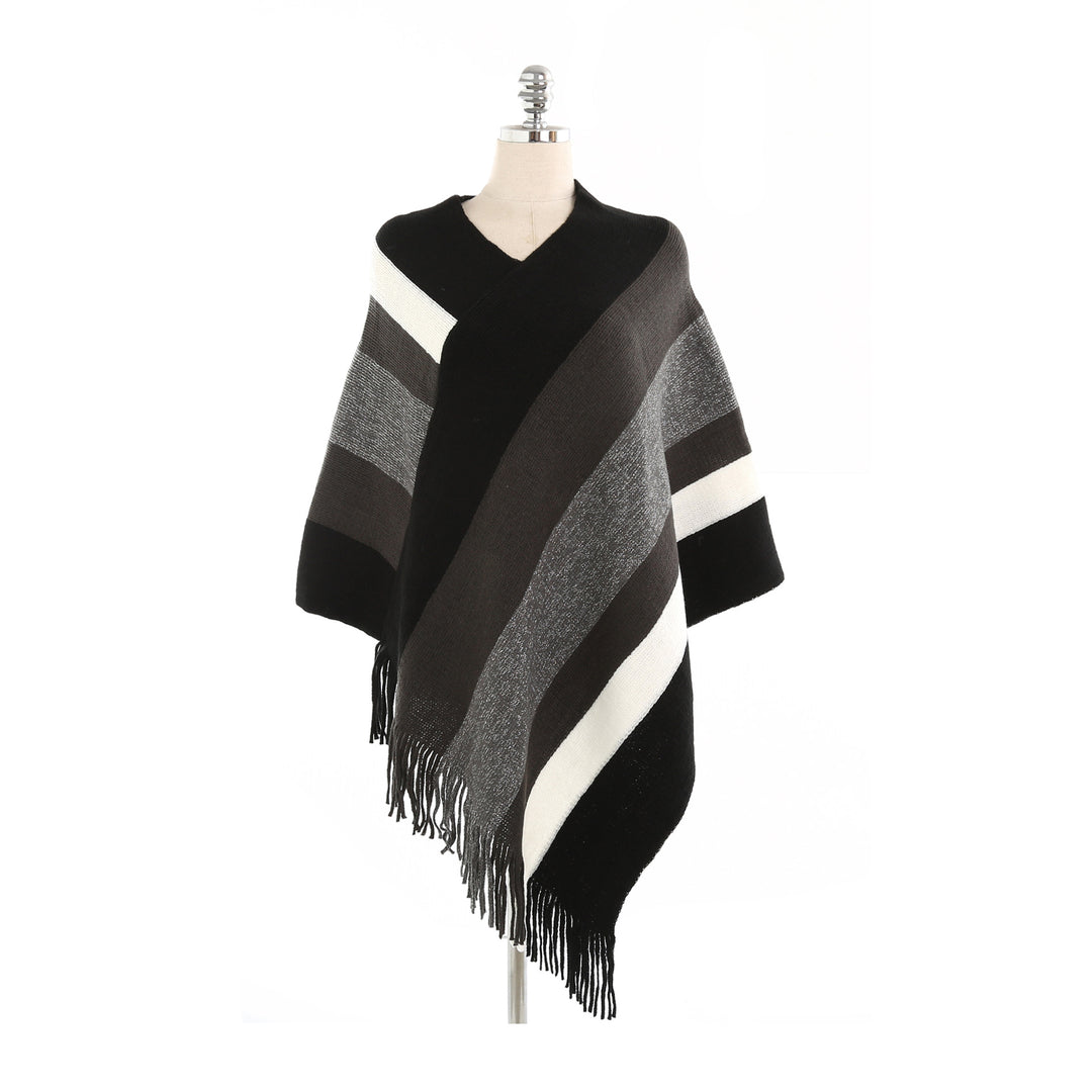 Damen Oversize‑Strickruana mit Fransensaum und diagonaler Blockstreifen‑Optik Echo Archiv