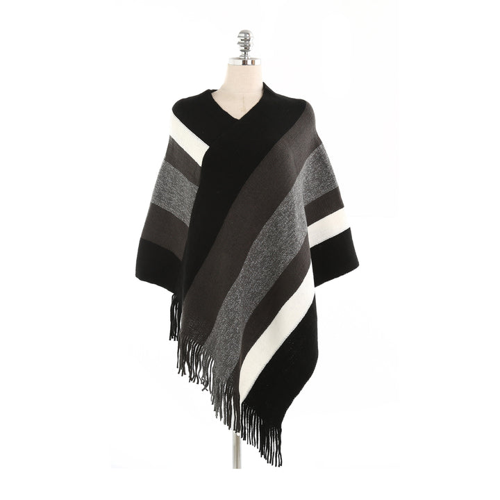 Damen Oversize‑Strickruana mit Fransensaum und diagonaler Blockstreifen‑Optik Echo Archiv