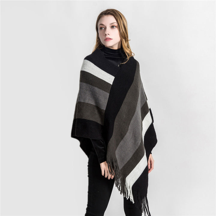 Damen Oversize‑Strickruana mit Fransensaum und diagonaler Blockstreifen‑Optik Echo Archiv
