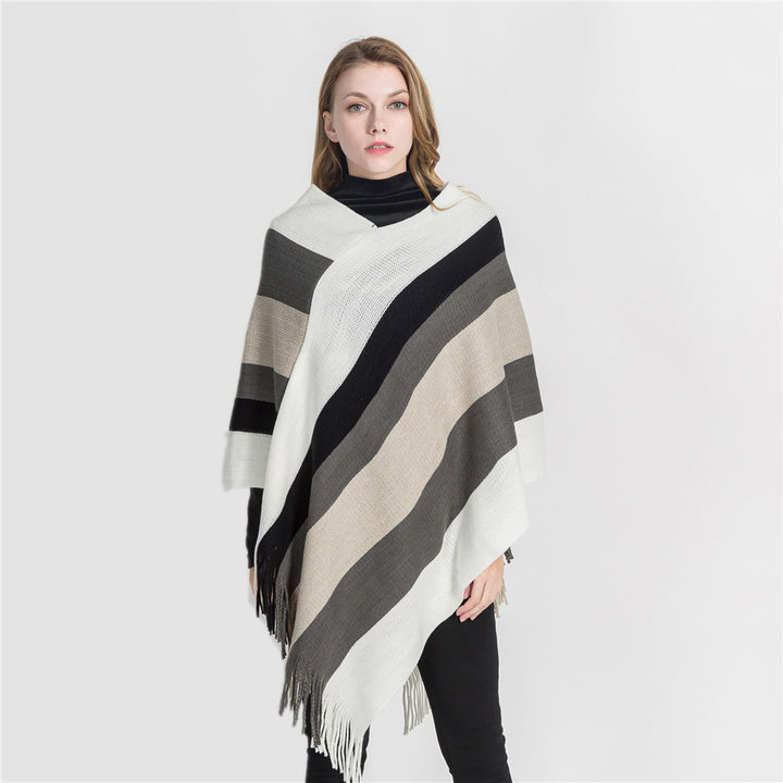Damen Oversize‑Strickruana mit Fransensaum und diagonaler Blockstreifen‑Optik Echo Archiv