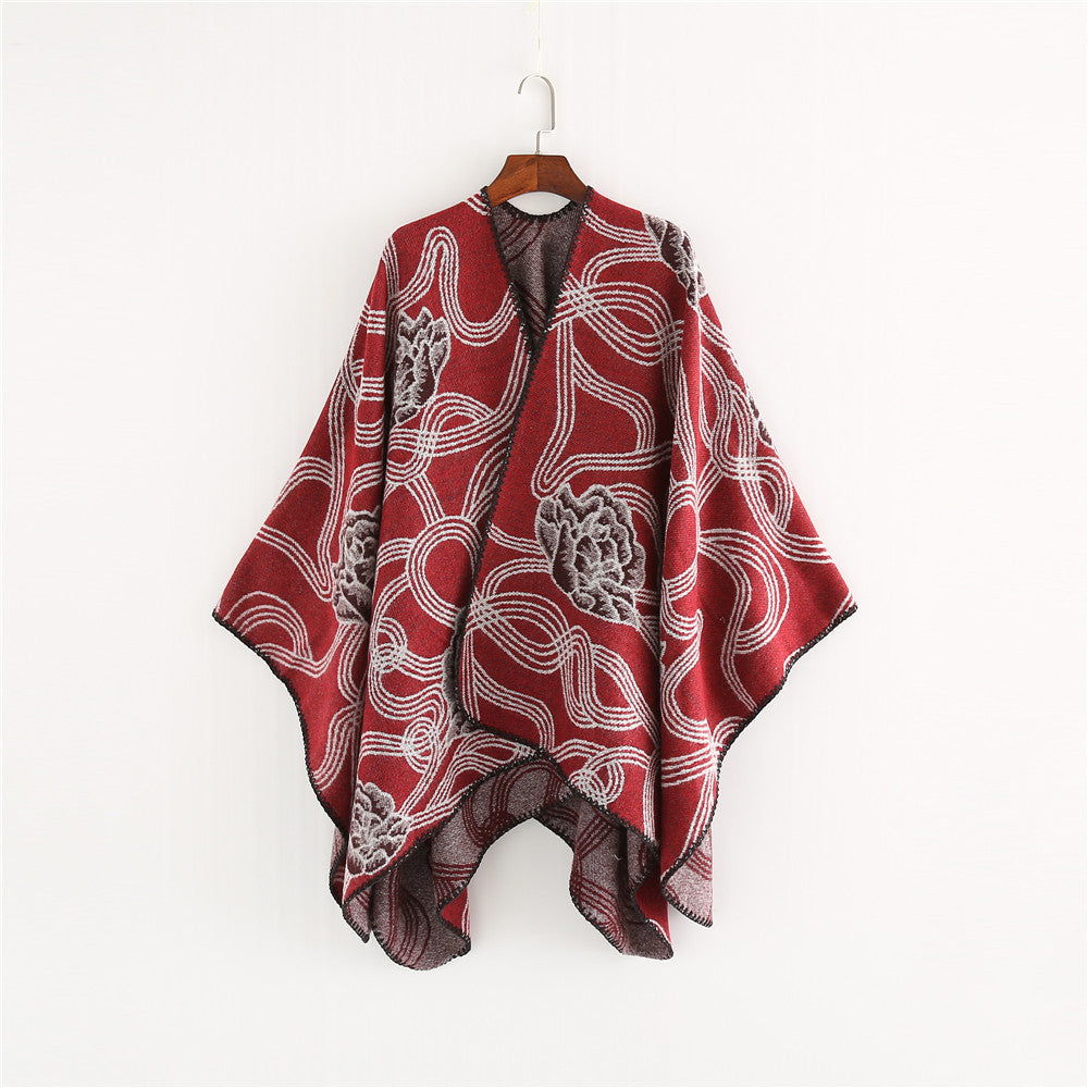 Damen Jacquard‑Ruana mit floralem Relief und kontrastierter Kettelnaht Echo Archiv
