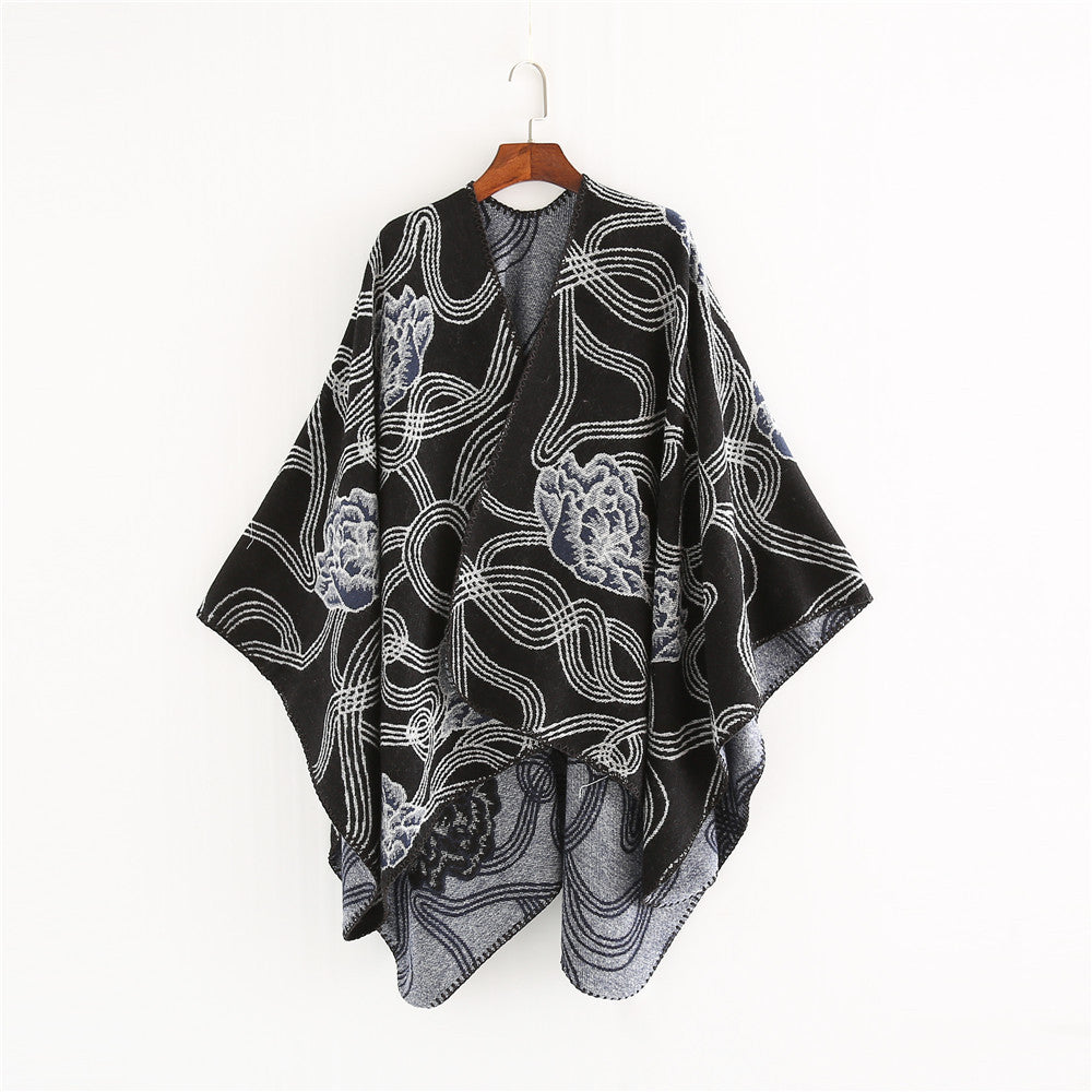 Damen Jacquard‑Ruana mit floralem Relief und kontrastierter Kettelnaht Echo Archiv