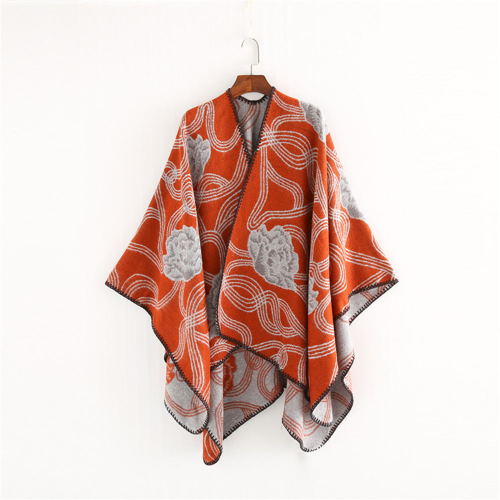 Damen Jacquard‑Ruana mit floralem Relief und kontrastierter Kettelnaht Echo Archiv