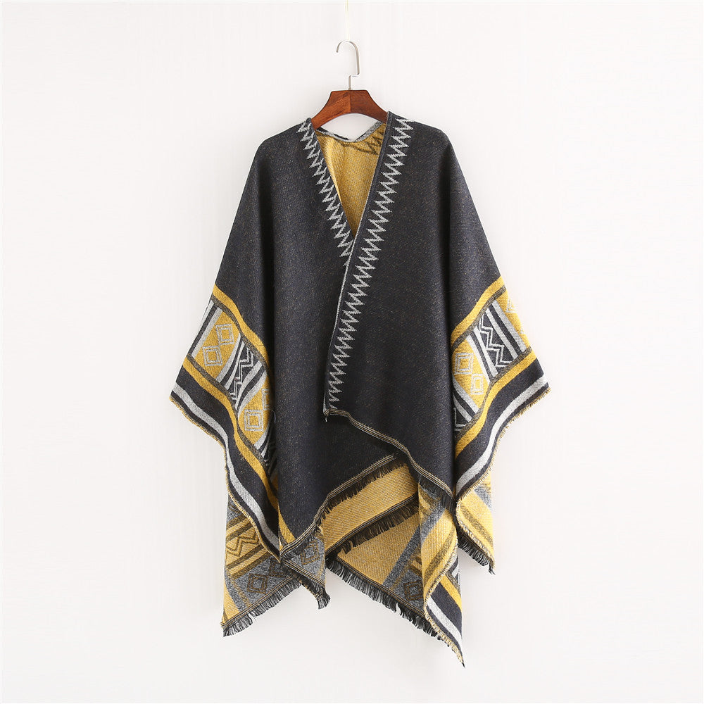 Damen Oversize-Ruana-Poncho im Boho-Ethno-Look aus Wollmix mit V-Ausschnitt und Fransensaum – Célinea