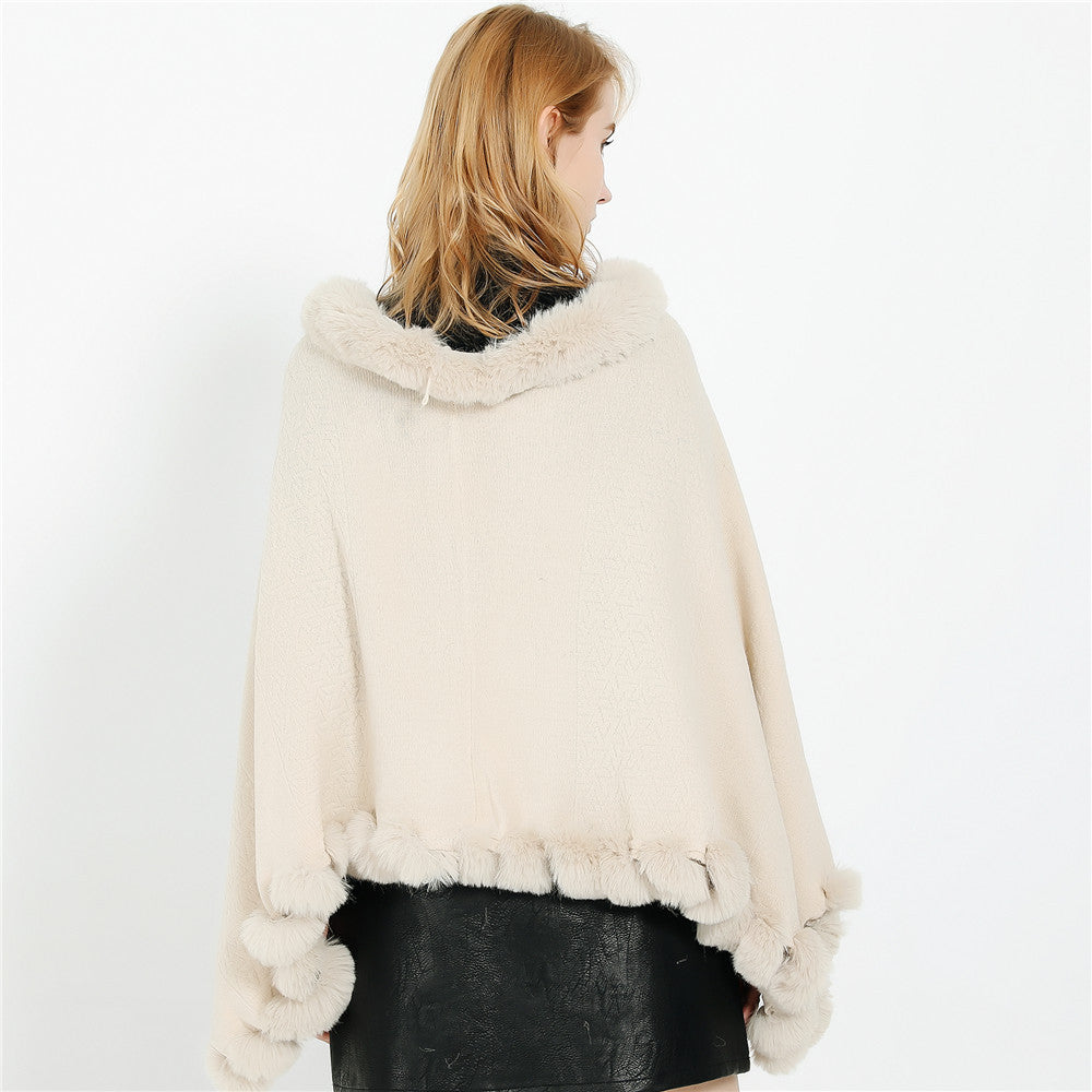 Damen Eleganter Capeponcho aus Wollmix mit Kunstfellbesatz und Pompon-Details – Montévia