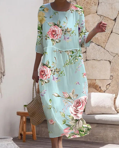 Echoarchiv | Elegantes Floral Kleid, das den Bauch kaschiert