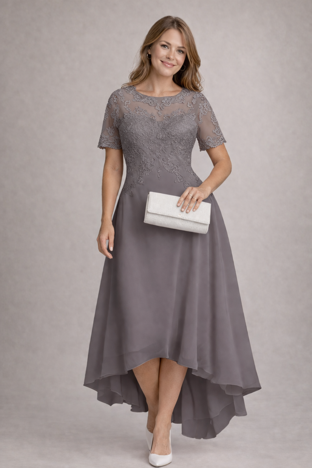 Echoarchiv Damen Abendkleid mit Spitze und kurzen Ärmeln