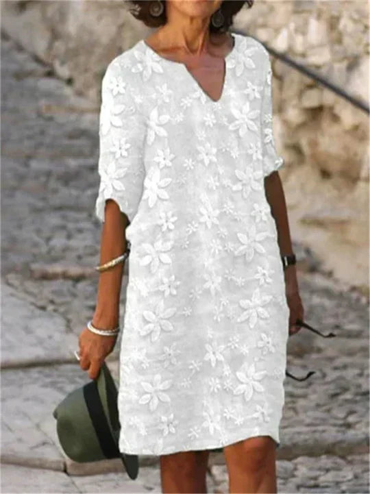 Echoarchiv | Elegantes Midi-Blumenkleid