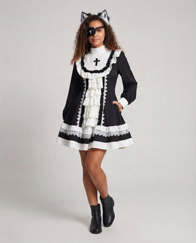 Damen Spitzen-Kleid mit Rüschen und Kreuzdetails Echo Archiv