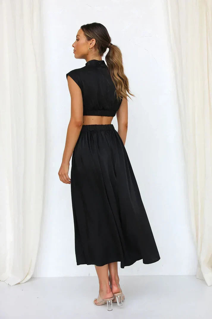 Echoarchiv | Eleganter Jumpsuit mit Cut-Out Taille