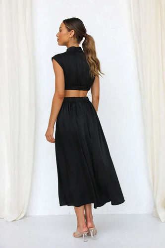Echoarchiv | Eleganter Jumpsuit mit Cut-Out Taille