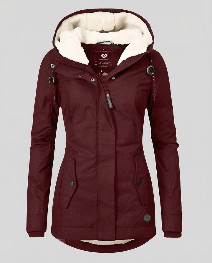 Warme Winterjacke mit Kapuze für Damen | Echoarchiv