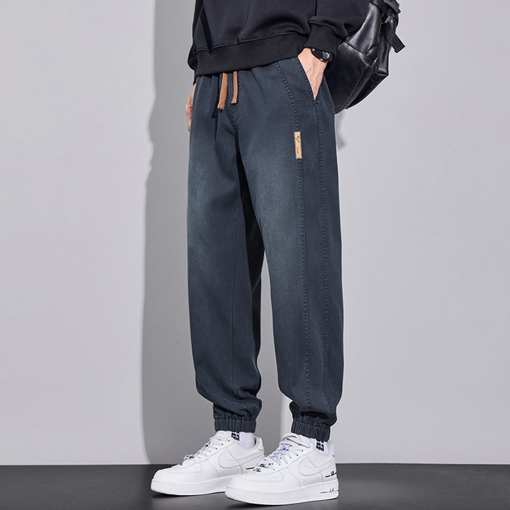 Herren Relaxed-Fit Jogginghose im Denim‑Look mit elastischem Bund, Tunnelzug und geripptem Beinabschluss Echo Archiv