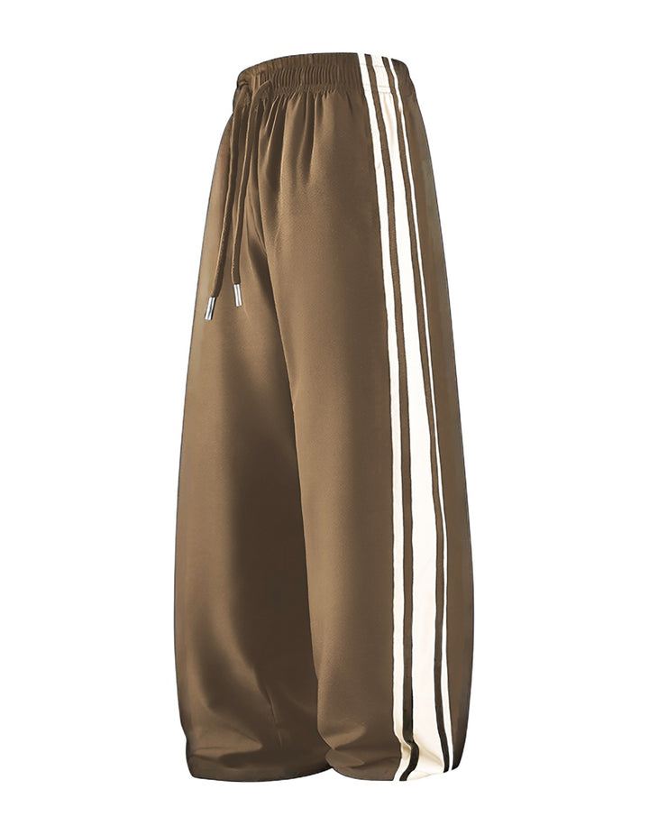Damen Weite Trackpants mit Tunnelzugbund und seitlichen Kontraststreifen Echo Archiv