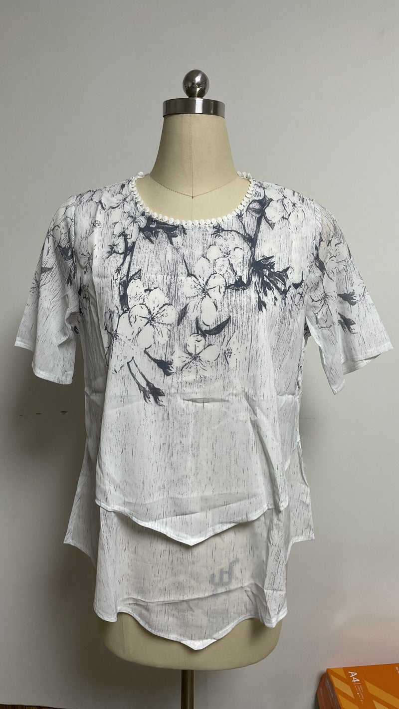 Damen nan zweilagiges Blusenkleid mit asymmetrischem Stufensaum, floraler Druckpasse und Flügelärmeln Echo Archiv