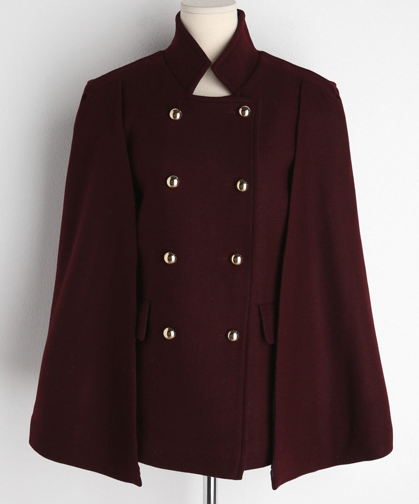 Damen Mantelcape im Tailoring‑Look mit doppelreihiger Knopfleiste und markanter Schulter Echoarchiv