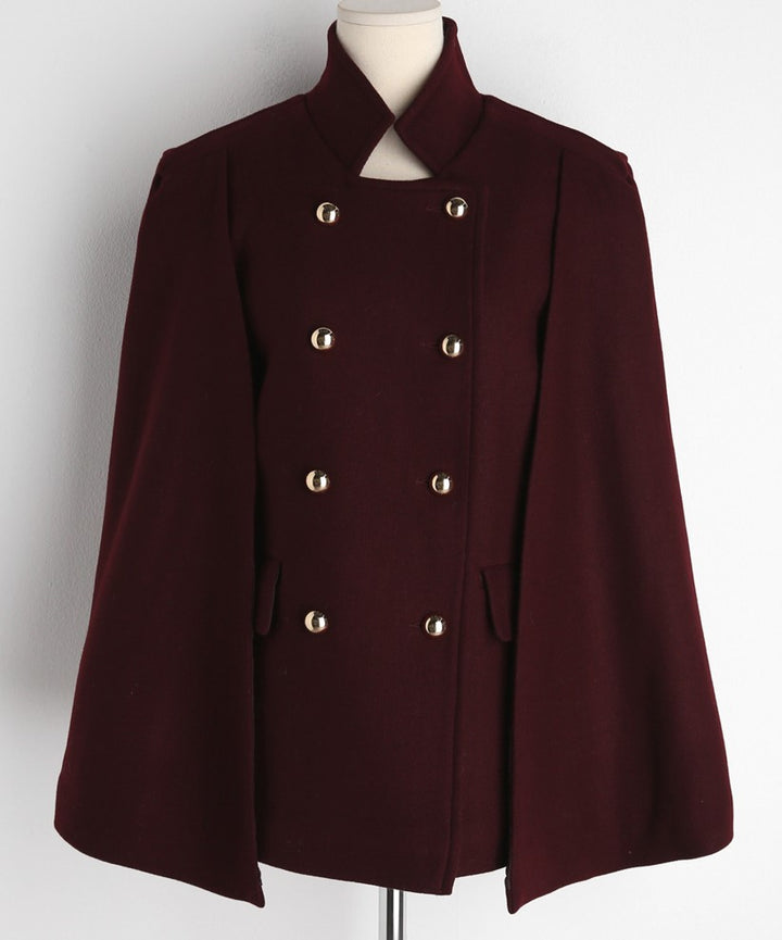 Damen Mantelcape im Tailoring‑Look mit doppelreihiger Knopfleiste und markanter Schulter Echoarchiv