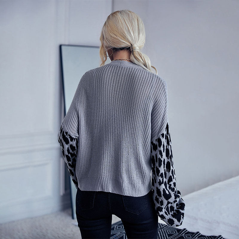 Damen Oversize Strickcardigan mit Leopardenmuster-Ärmeln und V‑Ausschnitt Echoarchiv