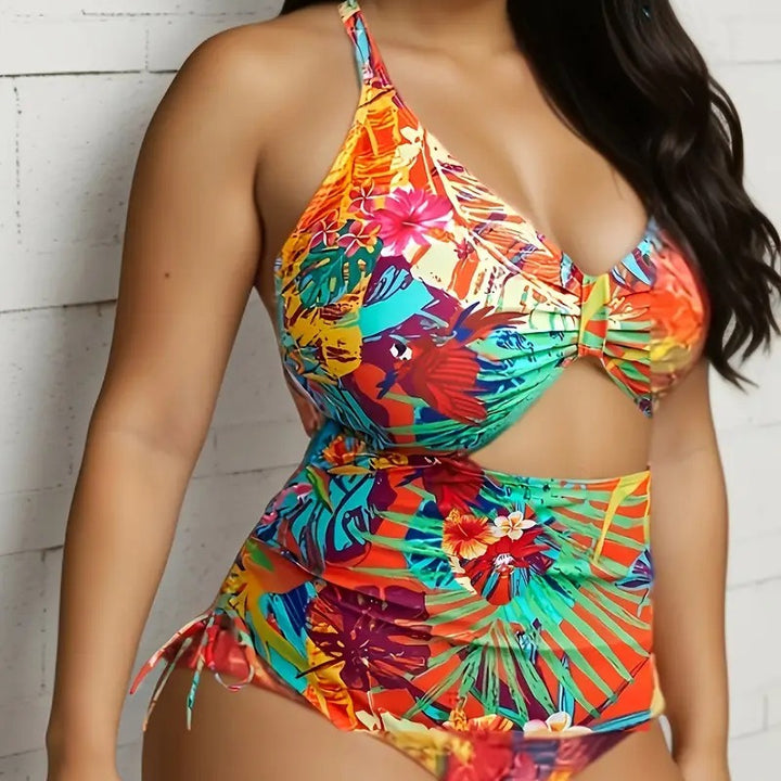 Damen Einteiliger Badeanzug mit exotischem Schnitt und buntem Tropen-Design Echo Archiv
