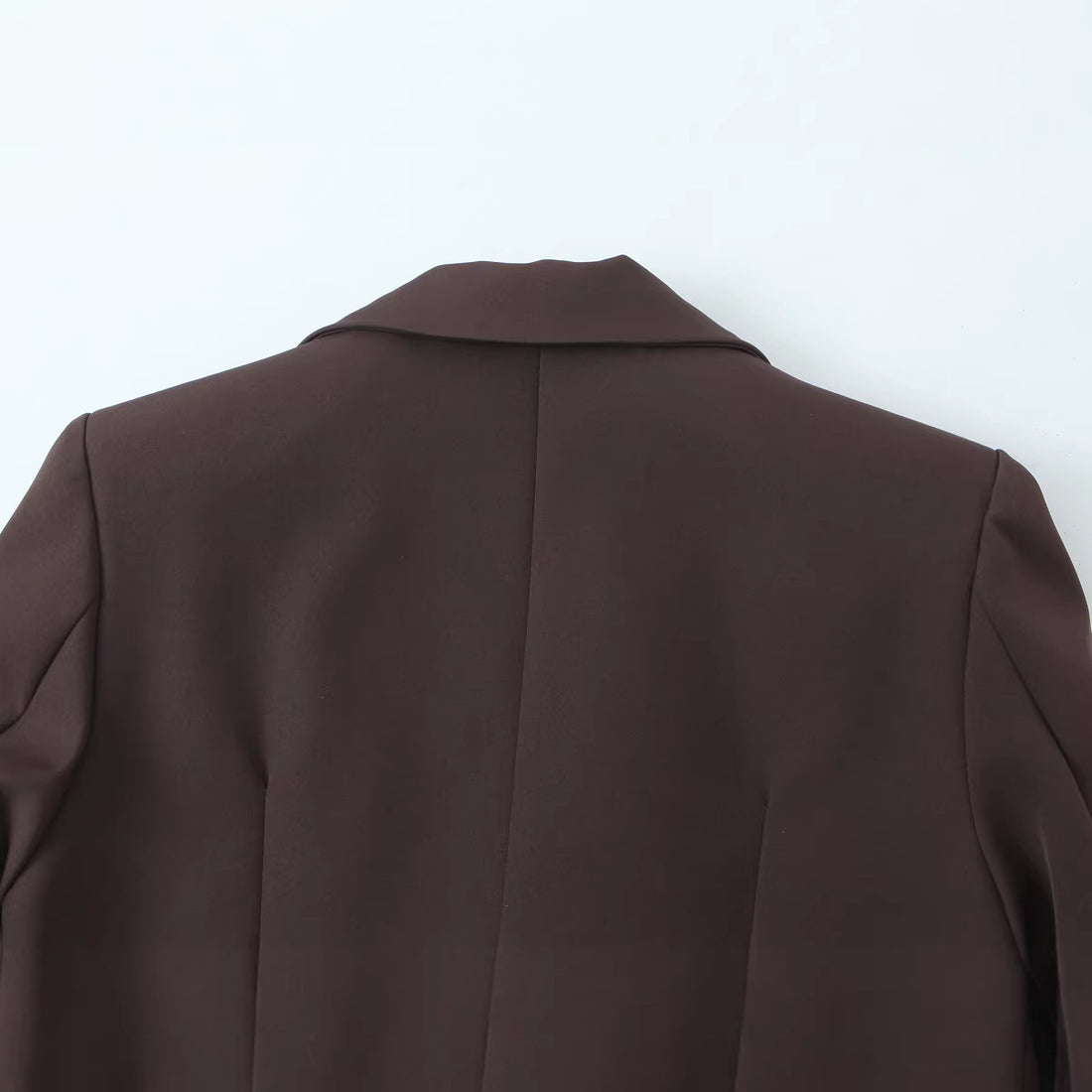 Damen Kurzblazer mit Doppelknopfverschluss und fallendem Revers Echoarchiv