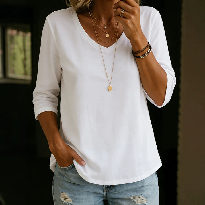 Damen Lockeres V-Ausschnitt-Shirt mit 3/4-Ärmeln und gerundetem Saum – Orélia