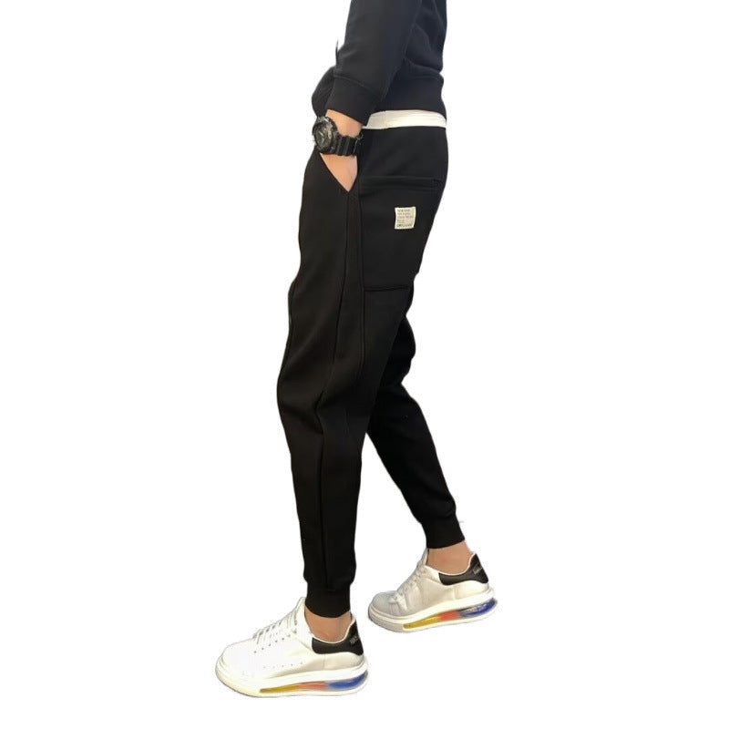 Herren Jogginghose mit tailliertem Tapered‑Schnitt, Bügelfalte und elastischen Bündchen Echoarchiv