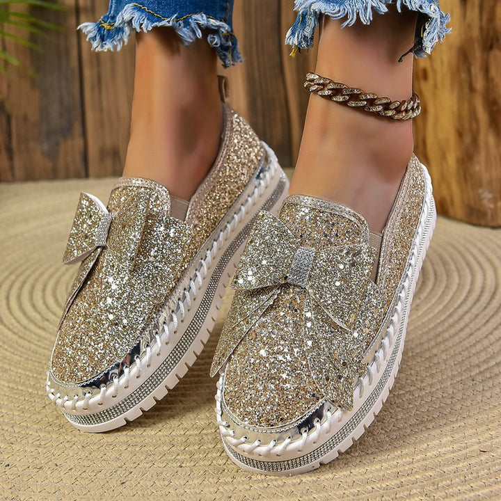 Damen Glitzer-Plateau-Slipper mit Schleifenapplikation und profilierter Komfortsohle Echo Archiv