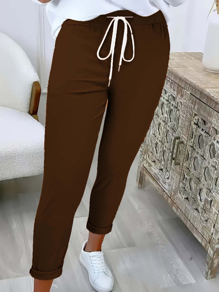 Damen Slim-Fit Jogginghose mit Tunnelzug und Umschlagbündchen Echoarchiv