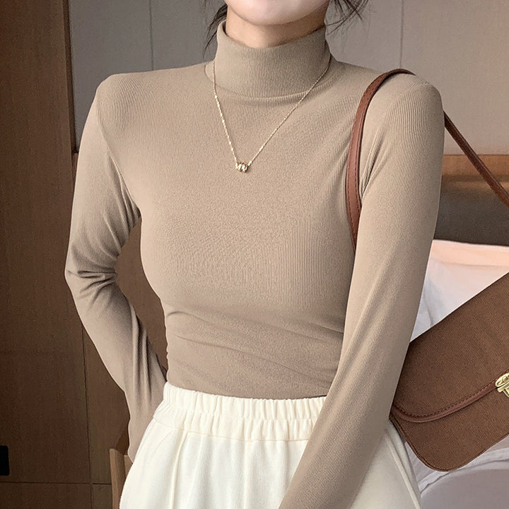 Damen Elegantes und figurbetontes Langarm-Rollkragenoberteil Echo Archiv