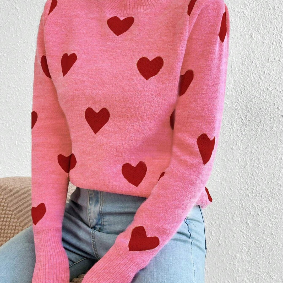 Damen nan kaschmirähnlicher Feinstrickpullover mit Allover-Herzmotiv, Rundhalsausschnitt und verlängerten Bündchen Echo Archiv