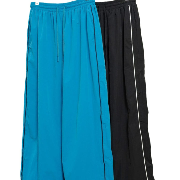 Damen Weite Nylon-Trainingshose mit Kontrastpaspeln und Elastbund Echoarchiv