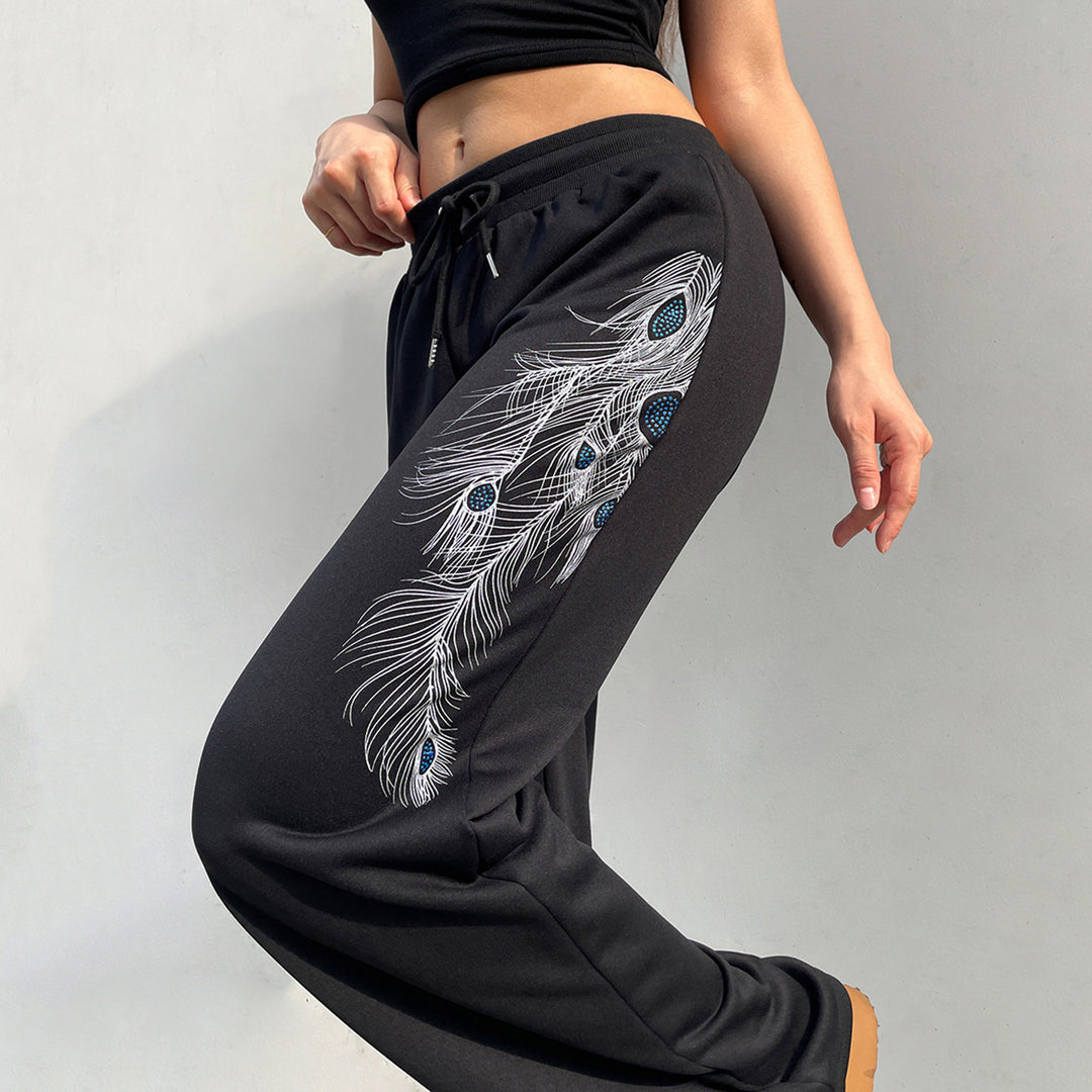 Damen nan weite Loungehose mit Kordelzug, hohem Komfortbund und Pfauenfeder-Print Echo Archiv