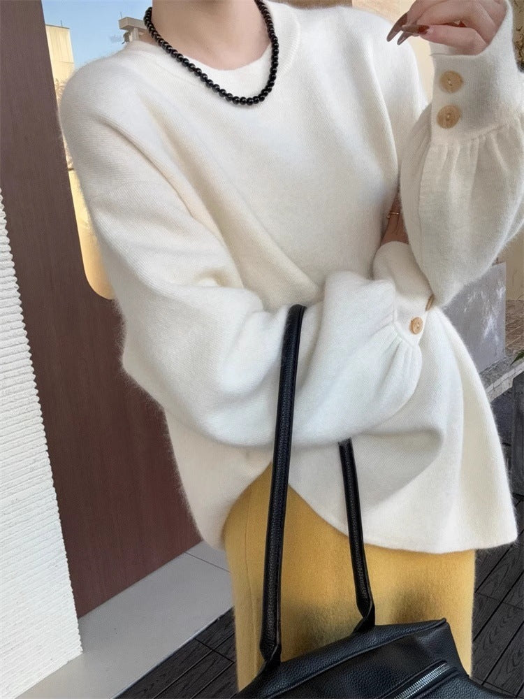 Damen Oversize-Feinstrickpullover mit Ballonärmeln und Knopfmanschette Echoarchiv
